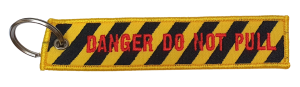 BRELOK z haftem EMERGENCY USE ONLY 502